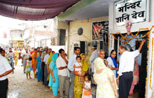 People throng the Shani Dev Mandir to pay obeisance to the deity on his birth anniversary in Bathinda on Tuesday.