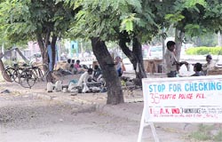 Slip road near the roundabout of Sectors 7, 8, 17 and 18 in a dilapidated condition while the road is encroached upon by chic weavers