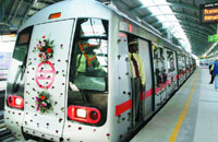 Delhi Metro driver waits for the flag-off during the inauguration of an extension of the Rithala-Shahdra Metro line at Dilshad Garden station in New Delhi on Tuesday.