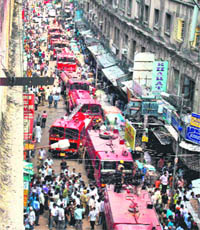 Fire vehicles line up in the narrow lane at Burrahbazar, Kolkata, where a major fire broke out on Tuesday morning.