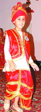 A student of Dayanand Model School performs during a function.