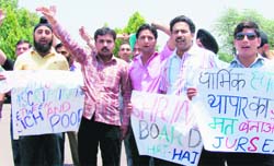 Members of the Jammu University Research Scholars Association protesting on the campus against the introduction of paid darshan at the Mata Vaishno Devi Shrine.