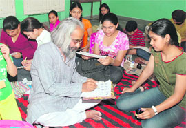President awardee Anees Siddiqui conducts a calligraphy workshop at Sacred Heart Convent School in Ludhiana on Tuesday.