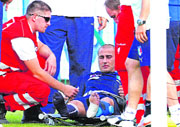 Italy's Fabio Cannavaro lies on the pitch after he was injured during a training session at the Suedstadt stadium in Maria Enzersdorf on Tuesday.