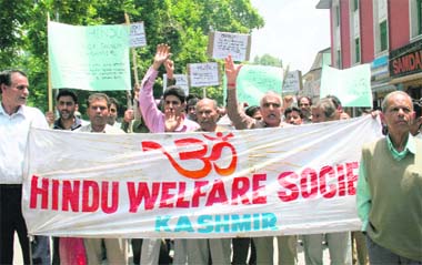 Kashmiri Pandits shout anti-government slogans during a protest rally in Srinagar on Wednesday.