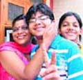 AIEEE topper Hitesh Jain with his mother after standing first in district in Ludhiana on Monday.
