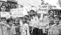 Schoolchildren take out a rally on World Environment Day in Ambala on Thursday.