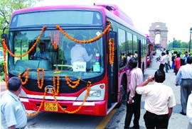 Air-conditioned low-floor CNG DTC buses at Rajpath in New Delhi on Thursday.