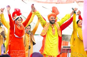 Singer Pammi Bai performs during the oath-taking ceremony for block samitis and zila parishad members in Ludhiana on Thursday. 