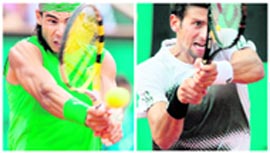Spains Rafael Nadal (L) will face Novak Djokovic of Serbia in the French Open semifinal in Paris