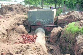 The dividing road of Sectors 29 and 30, Chandigarh, lying dug up on Friday.