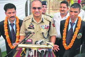 IGP, Jammu zone, K.Rajendra flanked by Ram Singh who recently scaled Mount Everest, briefing mediapersons about his next endeavour in Jammu on Friday.