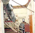 A collapsed roof of a house in Khanna. 