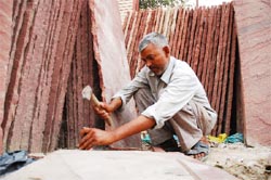 A staff at a marble and stone company in Bathinda