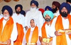 CM Parkash Singh Badal with members of the panchayati raj institutions at Killianwali village in Muktsar