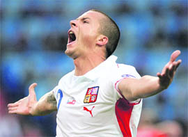 Czech Republics Vaclav Sverkos celebrates his goal during their Group A Euro 2008 match against Switzerland at St. Jakob Park stadium in Basel on Saturday.