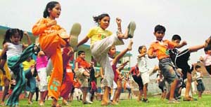 Students of International Public School attend a Karate workshop on the school premises in Ludhiana.