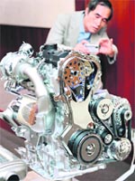 Japan's auto giant Nissan Motor displays a cut-model of the prototype diesel turbo-charged engine "M9R" in Tokyo