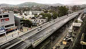 A busy flyover bears a deserted look after opposition parties called for a 12-hour Assam bandh against hike in petroleum prices in Guwahati on Monday.