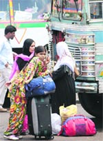 Passengers waiting at the Jammu bus stand