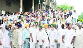 The Bharti Kisan Union (BKU) staged a dharna outside the deputy commissioners office in Ludhiana on Monday.