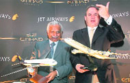 Jet Airways chairman Naresh Goyal (left) along with Etihad Airways' chief executive James Hogan after announcement of a new code share agreement and frequent flyer partnership between the two companies, in Mumbai on Tuesday.