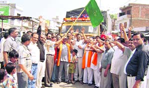 Trucks, carrying ration for Amarnath Yatra, flagged off at Ahmedgarh on Monday. 