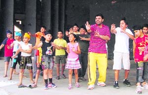 Bhangra expert Ravinder Rengoowal takes a class during the summer camp in Ludhiana on Tuesday. 