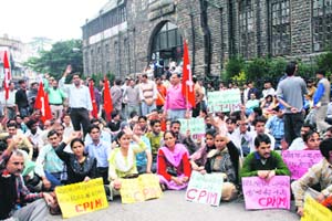 CPM activists hold a rally in protest against the hike in the prices of petrol, diesel and cooking gas on The Mall in Shimla on Wednesday . 