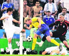 Sweden's Petter Hansson (second from left) scores during the group D match between Greece and Sweden in Salzburg, Austria, at the Euro 2008 on Tuesday. 