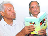 Dr R. Kumar with Dr Rashpal Malhotra at CRRID, in Chandigarh, on Thursday.