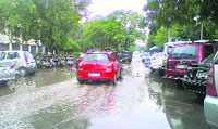 A road inundated with rainwater at Sector 17 in Chandigarh on Thursday.