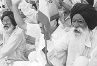 Member of Bhartiya Kissan Union (Lakhowal) during the protest against hike of petrol prices in front of DC office, Mohali, on Thursday.