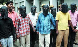 Seven persons were held for tresspassing on the MCD office in Lajpat Nagar in New Delhi on Thursday.