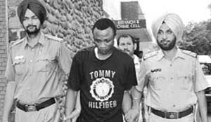 Bright in police custody in Chandigarh. 