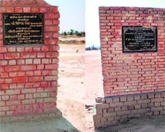 The two foundation stones laid by two politicians at Kavi, in Panipat district.