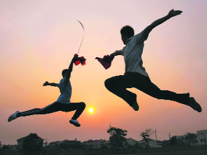 Students hone their skills at Xuecheng Martial Arts School in Zaozhuang, Shandong province, on Wednesday.