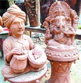 Beautiful clay creations on the roadside draw onlookers