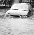 A car breaks down due to waterlogging in Patiala.