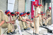 The police at Ghumar Mandi following a bandh call by shopkeepers in Ludhiana on Friday.