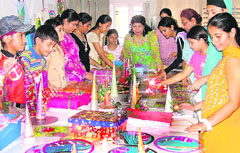 Students of GNI Public School during an art and craft exhibition, organised on the concluding day of the summer camp, in Ludhiana on Friday.