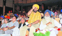 GURU GYAN: From BJP MP Navjot Singh Sidhu to Chief Minister Parkash Singh Badal during a presentation of a development project in Amritsar on Friday.