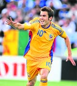 Romanian forward Adrian Mutu celebrates after scoring the first goal for this team against Italy on Friday.