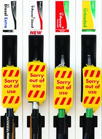 Out of use signs are seen at a Shell petrol station in Leicester, England, on Sunday. A four-day strike over pay by hundreds of tanker drivers hit Shell fuel stations across Britain after last-ditch pay talks broke down.