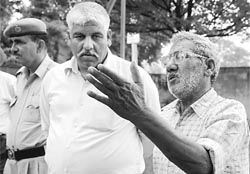 Sureshs father Gurdial Ram (left) waits for the body of his son outside the civil hospital mortuary in Rajpura on Sunday.