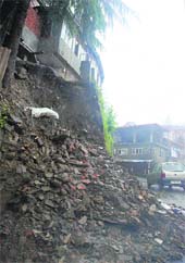 Heavy rain triggered a landslide in Sector 1 of New Shimla on Sunday.