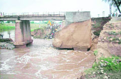 A view of the road near the Ghaggar near Ratia in Fatehabad district that caved in on Monday.