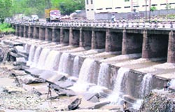 Theunder-construction retaining wall of the Balad bridge at Baddi that was damaged after heavy rain