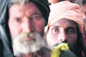 Sadhus wait for their turn to get themselves registered for the Amarnath yatra