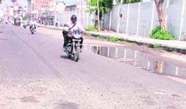 Pothole emerge on the newly recarpeted Humbran road in Ludhiana.